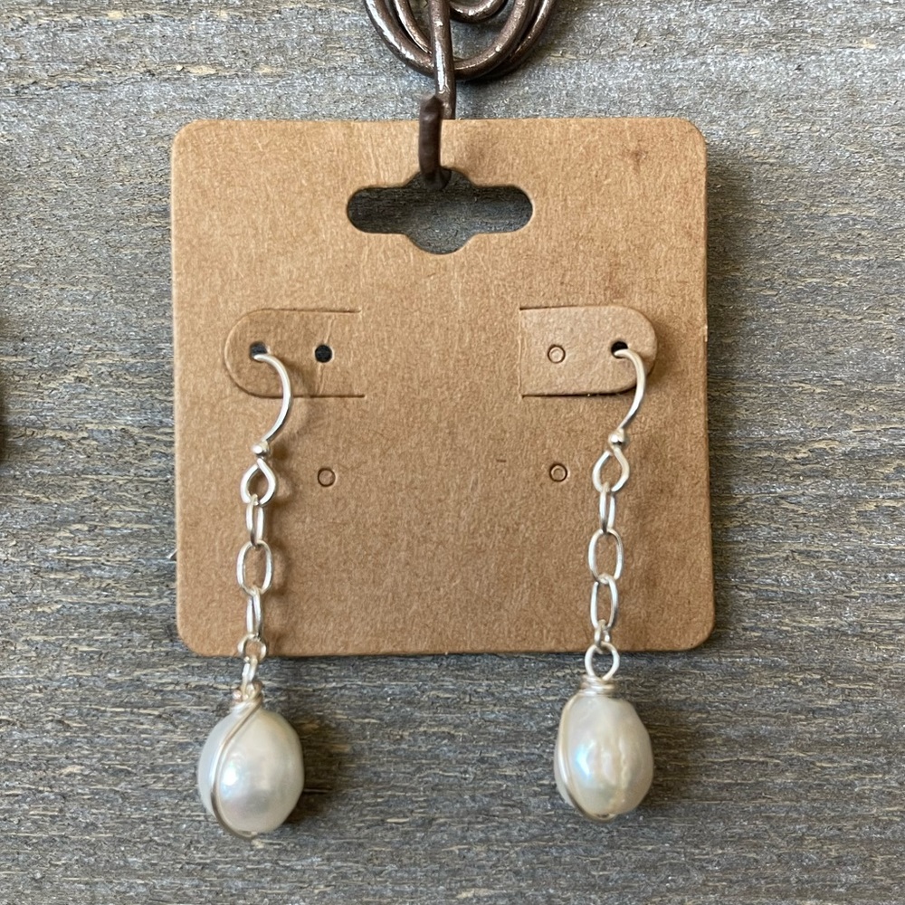 Hand wrapped Sterling Silver drop earrings with Fire Ball pearl